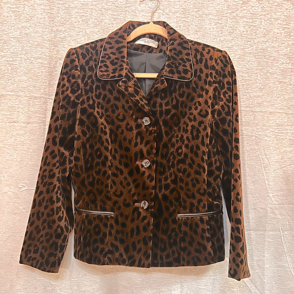 Leopard  print, velvet jacket and skirt.